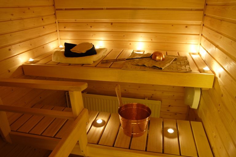 Interior of a Finnish sauna in candle light