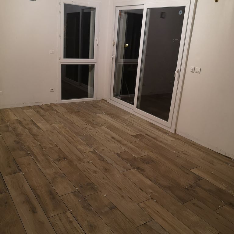 Pose d'un carrelage: Sols; 38 m²