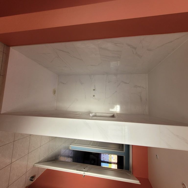 Pose d'un carrelage: 20 m2