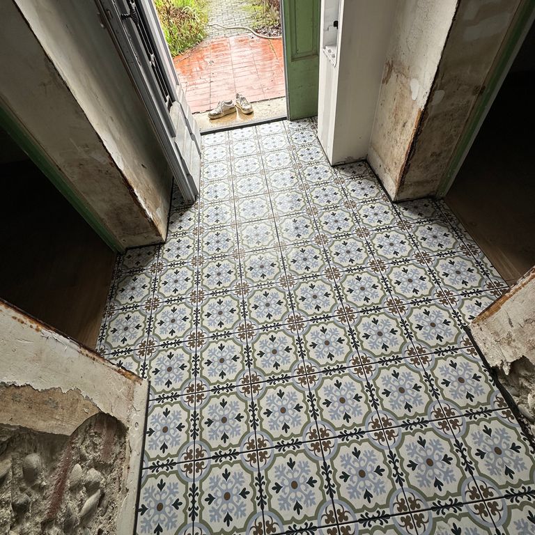 Pose d'un carrelage: Sols; 60 m²