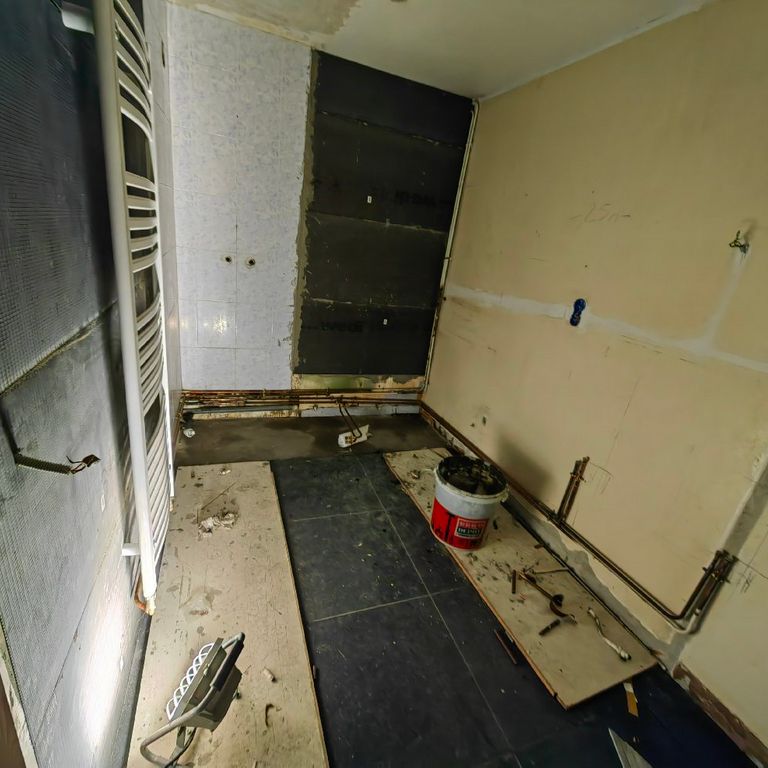 Pose d'un carrelage: 30 m²