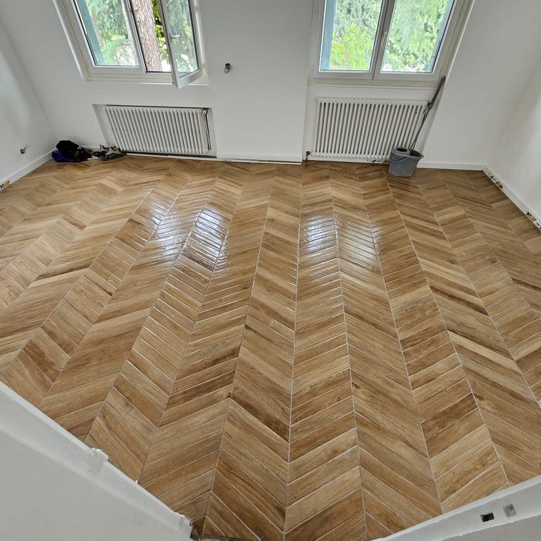 Pose d'un carrelage: Sols; 45 m²