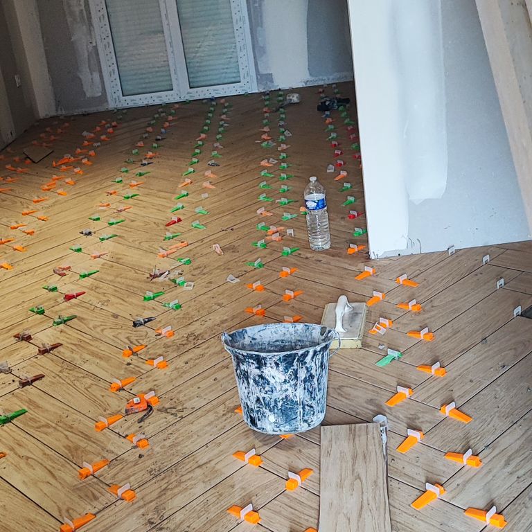 Pose d'un carrelage: Murs, Sols; 50 m²