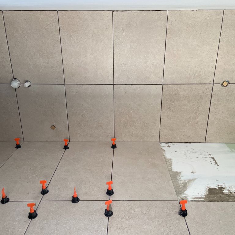 Pose d'un carrelage: Murs; 14 m²